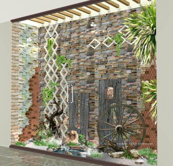 bài trí tranh đá kèm với thác nước trong nhà làm cho không gian trở lên mát mẻ 